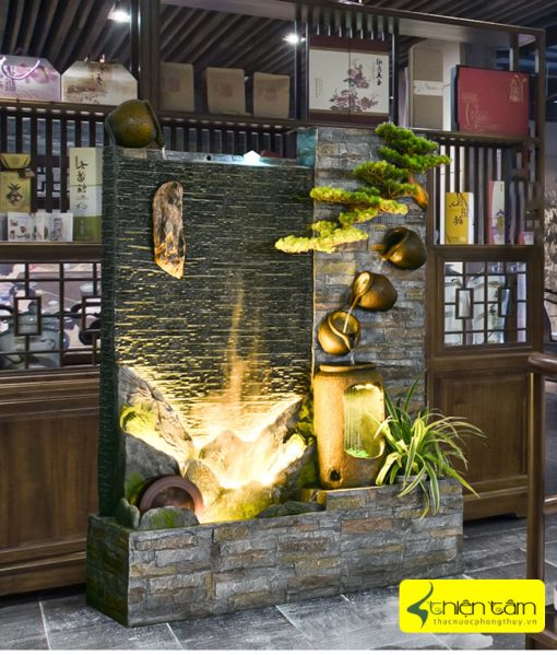 thác nước phong thủy tường nước lớn trang trí tại quán trà